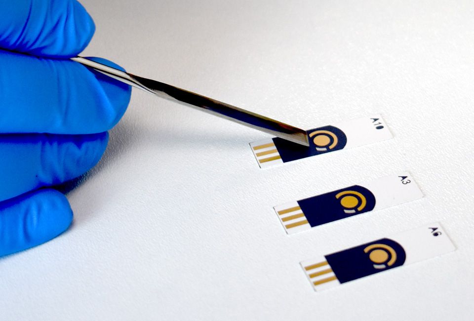 Screen-printed sensors held with tweezers