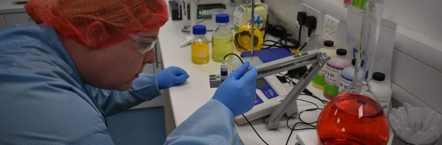 FlexMedical scientist preparing reagents in the lab